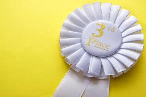3rd place runner up white rosette with text Stock Photos