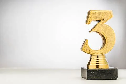 3rd placed runner up metallic gold trophy Stock Photos