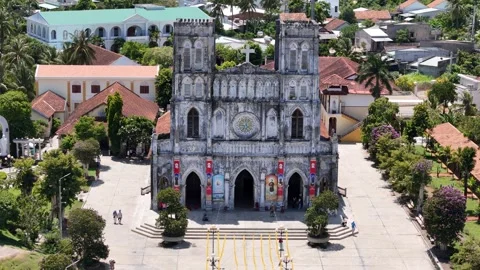 3x aerial pullback from Mang Lang Church facade Stock Footage 341855962