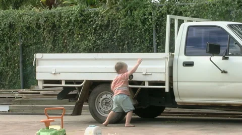 3yo boy climbs onto vehicle Video stock 975592