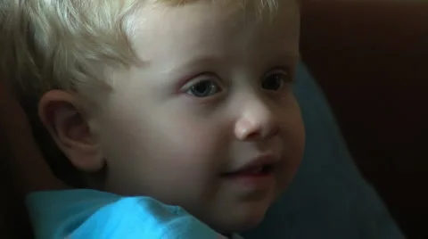 3yo boy watching tv closeup Video stock 1065073