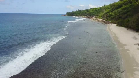 3Z wavesCamera is moving along the amazing beach in Pacific Stock Footage 120250739