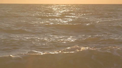 4 IN 1 Gradual sunset over the horizon at the storming sea Stock-Footage 8365699