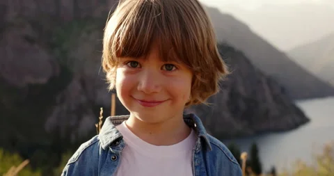 4-5 years boy portrait smiling at camera, cute happy caucasian blond child in Video stock 224302589
