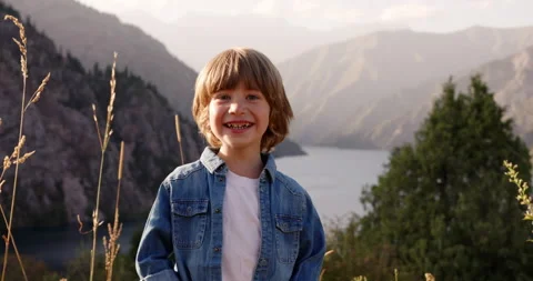 4-5 years boy portrait smiling and laughing at camera, happy caucasian child in Stock Footage 224303883