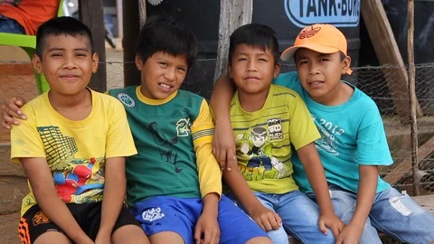 4 boys look at camera with thumbs up Stock Footage 95496471