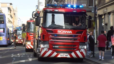 4 British Fire Trucks With Sirens On Location During Emergency Stock Footage 119312681