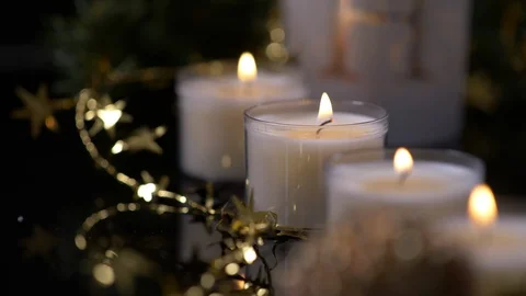4 Candles Nested in Gold Star Decoration. Christmas Video stock 128746768
