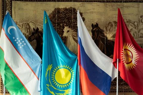4 Central Asian state flags - Uzbekistan, Kazakhstan, Russian Federation and Stock Photos