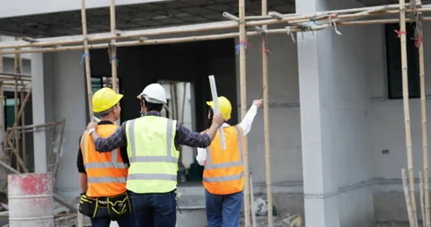 4 civil engineer walks into the house Stock Footage 195615635