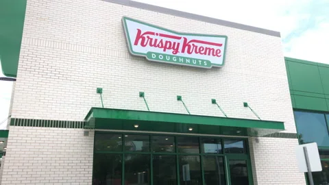 4 Clips on New Krispy Kreme Donuts Shop, Store Exteriors Stock Footage 203921557