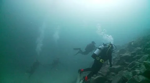 4 divers ascedn Stock Footage 12536659