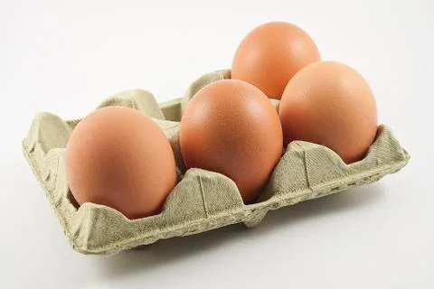 4 eggs Stock Photos