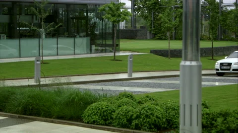 4 Exclusive Limousines, Elegant A8 L driving in modern business center Stock Footage 49201041