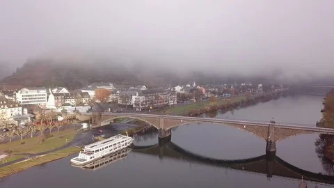 4 | FOG SETTING IN OVER BRIDGE IN COCHEM | AERIAL Stock Footage