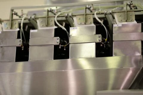 4 head linear weigher machine for food packaging Stock-Fotos