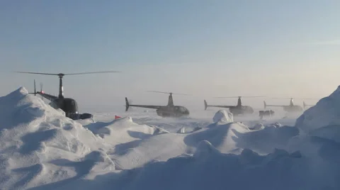 4 helicopters taking off one by one. Russian Ice Camp at the North Pole. Video stock 61708408