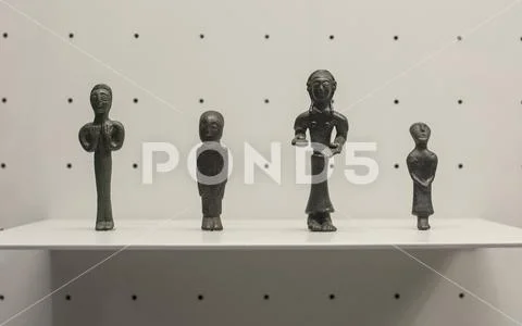 4 Iberian bronze votive offerings Stock Photos
