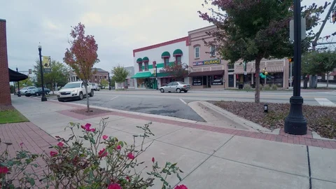 4 K-Car Backing Out And Driving Away-Small Rustic Town Stock Footage 98093236