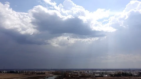 4 K Clouds With Sunrays Over Landscape Timelapse 002 Stock Footage 92499248