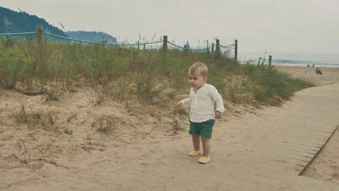 4 k cute brave small boy studying outward things at the vastness nature zone Stock Footage 93568053