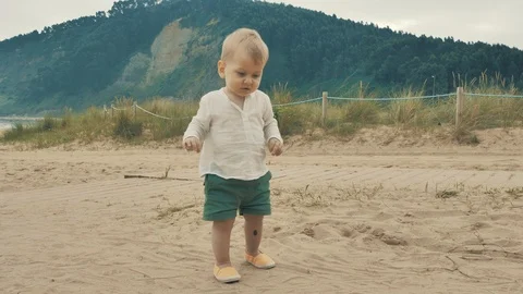 4 k cute brave small boy studying outward things at the vastness nature zone Stock Footage 93568084
