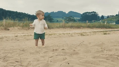 4 k cute brave small boy studying outward things at the vastness nature zone Stock Footage 93568097