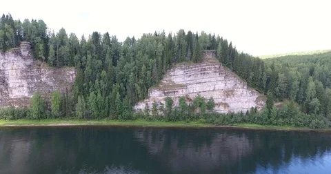 4 k flying over the river near the rocks Stock Footage 73423561