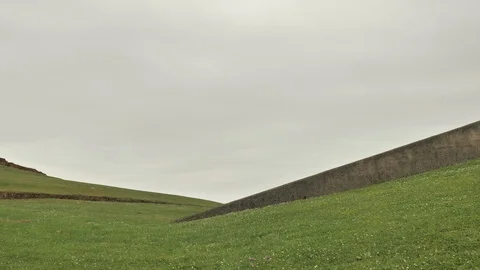 4 k green field view, abstract horizont, loneliness, dramatic sky with gray Stock Footage 92527635