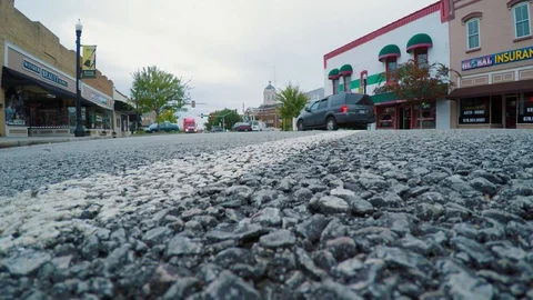 4 K-Low Shot Of Tractor Trailer Entering Scene And Stopping Stock Footage 98186770