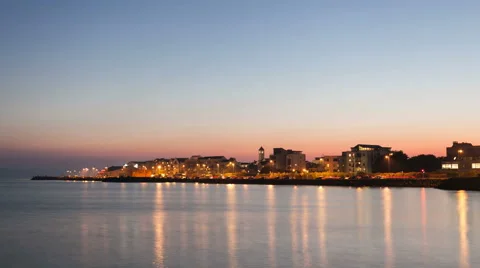 4 K time lapse video of the City on the bank of ocean bay Stock Footage 55673756