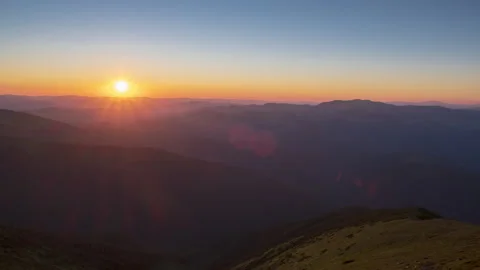 4 k time lapse video of beautiful sunrise  landscape with mountain ridge. Stock Footage 135141484