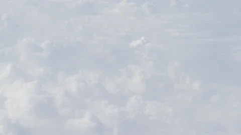 4 k video real time from airplane fluffy white beautiful clouds heaven Stock Footage 204924469