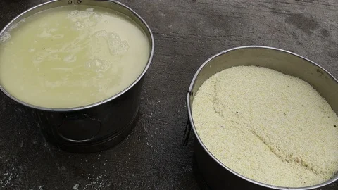 4-man-washes-rice-in-India Stock Footage 93378681