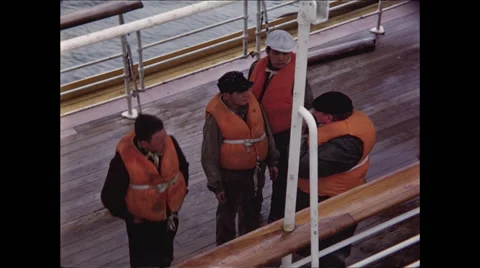 4 men in life vests Stock Footage 47646774