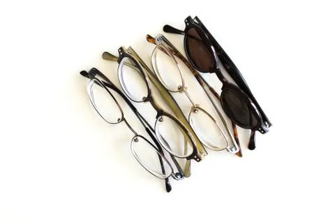 4 pair of glasses in a row Stock Photos
