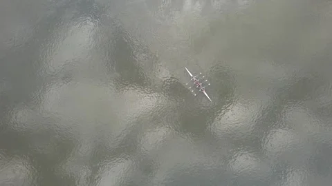 4 person rowing crew on the river while paddling Stock Footage 240664574