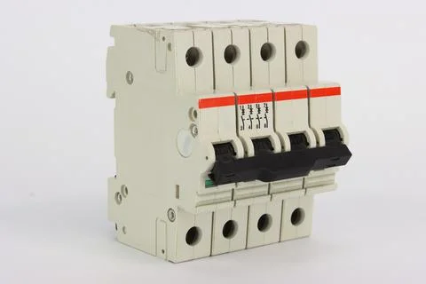 4-poles automatic electric switch for installation in an electric panel. Stock Photos