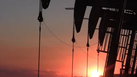 4 Pumpjack Heads up and down closeup at sunset -Oil Well Pump Stock Footage 105410080
