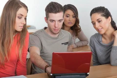 4 student in a classroom Stock Photos