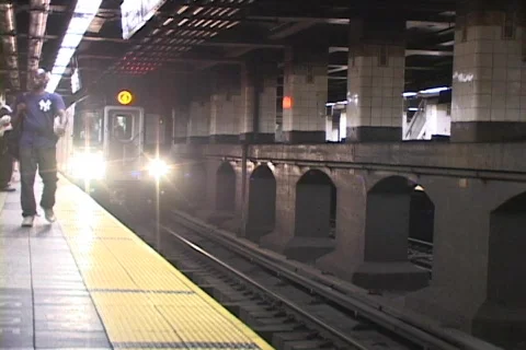#4 SUBWAY TRAIN PULLS INTO STATION Video stock 154324