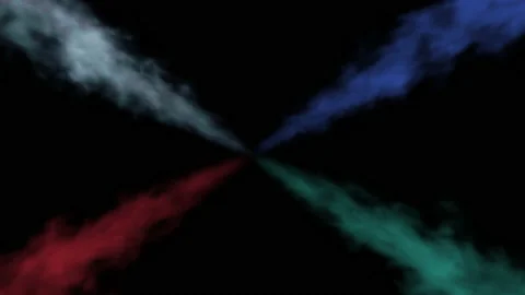 4 swift multicolored smoke streams moving from the center against a black Stock Footage 220929888