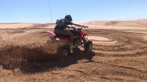 4-Wheeler Splashes sand in desert slo-mo Stock Footage 141398789