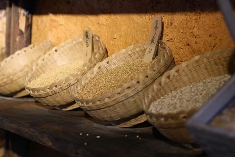 4 wicker baskets of rice Stock Photos