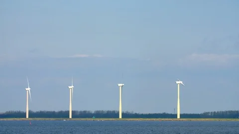 4 Windmills on the waterfront Stock Footage 108658256