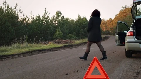 4 Woman calling for help on cell phone. Broken car Stock Footage 82137039