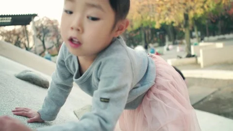 4-year-old kid playing outside on holidays Video stock 161858459