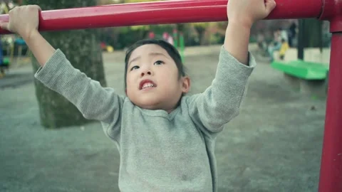 4-year-old kid playing on the playground Video stock 161858499