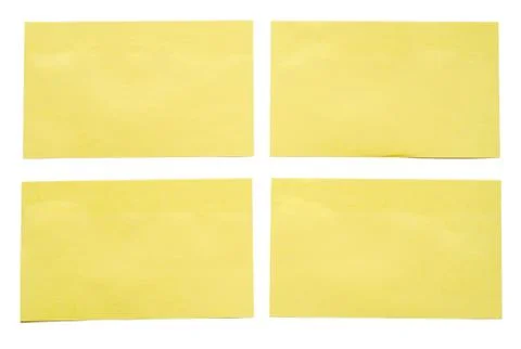 4 yellow notes stuck to a white background. Stock Photos