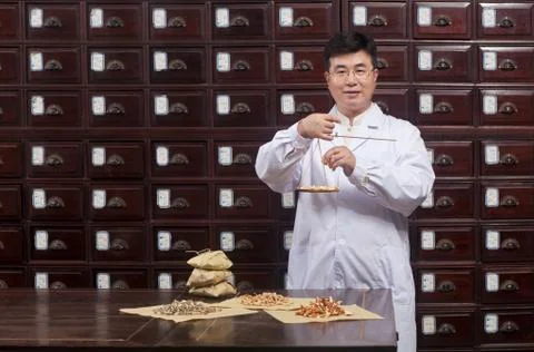 40 to 60. Weighing tools Drawer Middle-aged and elderly men Asians Drugstore Stock Photos